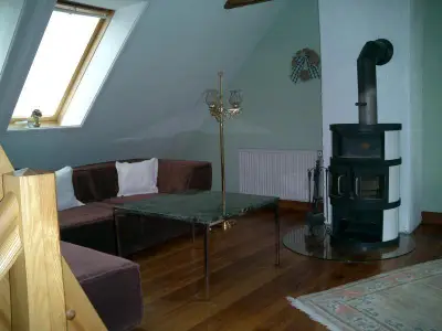 Die Wohn-Sitzecke mit Kaminofen