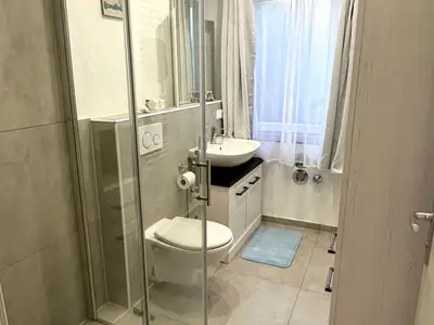 Badezimmer mit Bodenheizung auch in der Dusche