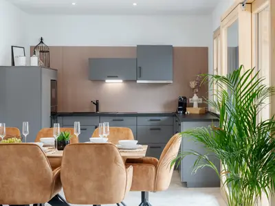 Der zentrale Treffpunkt unseres Apartments ist der großzügige Esstisch im Wohnessbereich für 8 Personen.