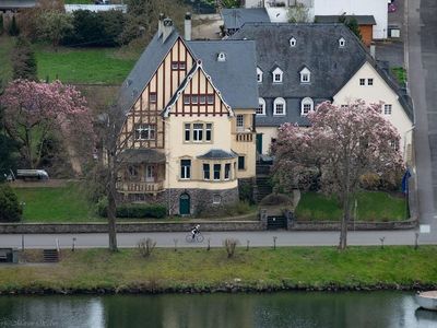 Haus mit Radfahrer