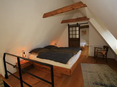 Schlafzimmer mit Dopplbett im Ferienhaus Sandsteintraum in Billerbeck