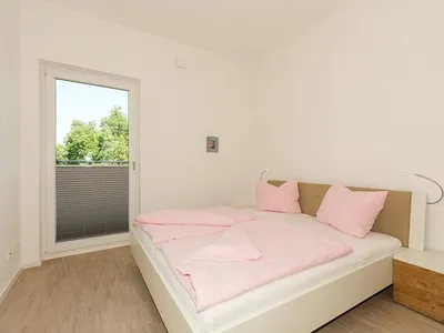 Schlafzimmer mit Doppelbett