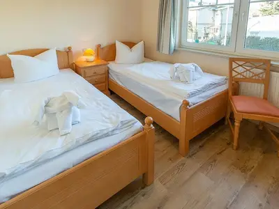 Schlafzimmer mit Einzelbetten