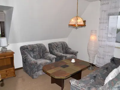 Wohnzimmer mit Sitzgarnitur