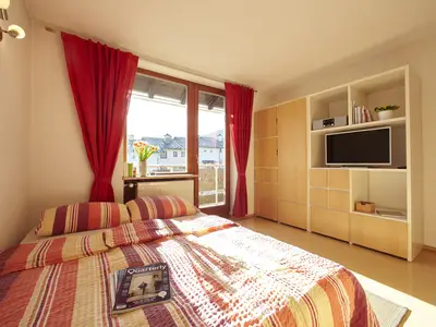 Wohn- und Esszimmer mit Schlafsofa