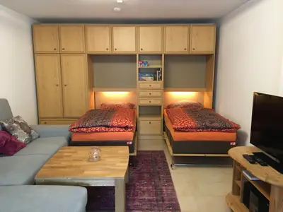 Klappbetten im Wohnzimmer