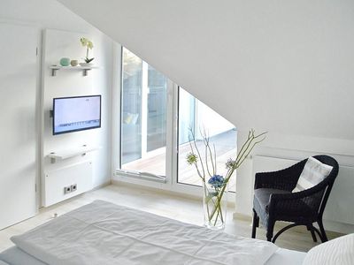 Schlafzimmer mit Fernseher