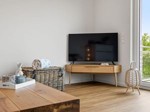 Wohnbereich mit Flatscreen-TV
