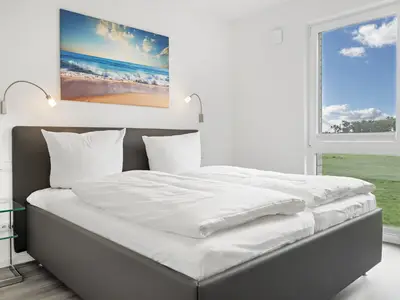 Schlafzimmer mit Doppelbett