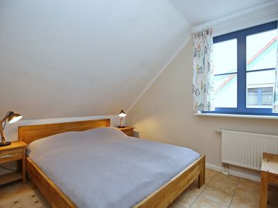 erstes Schlafzimmer mit Doppelbett