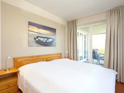 erstes Schlafzimmer mit Doppelbett