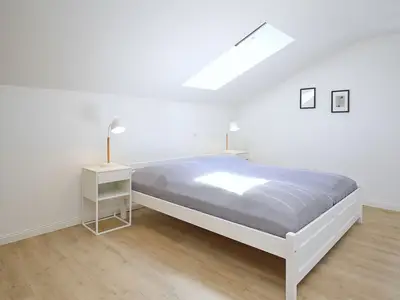 Schlafzimmer mit Doppelbett
