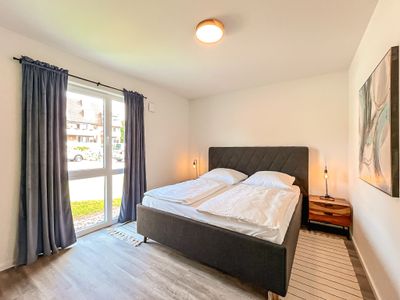 erstes Schlafzimmer mit Doppelbett