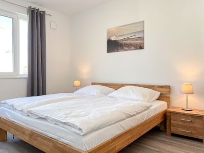 erstes Schlafzimmer mit Doppelbett