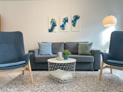 Wohnzimmer mit Schlafsofa