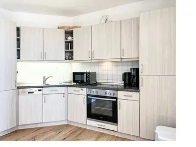 Küchenzeile im Wohnzimmer integriert