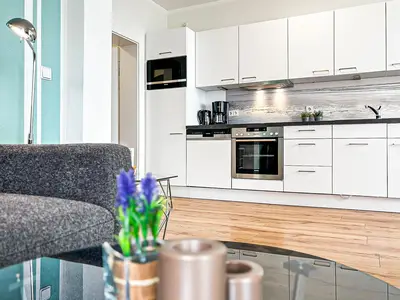 Wohnzimmer mit Blick zur Küche