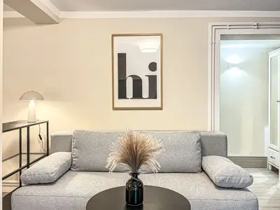 Wohnzimmer mit Schlafsofa