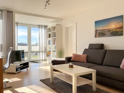 Wohnzimmer mit Zugang zur Terrasse