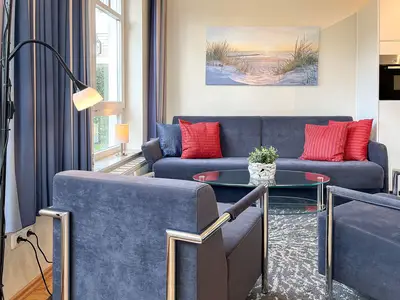 Wohnzimmer mit Schlafsofa