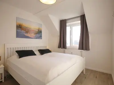 Schlafzimmer mit Doppelbett
