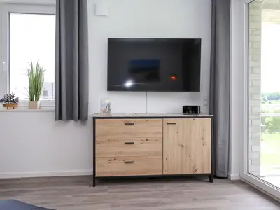 Wohnzimmer mit Blick zum TV