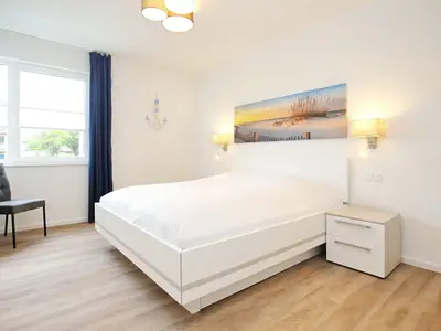 erstes Schlafzimmer mit Doppelbett