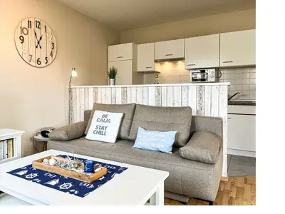 Wohnzimmer mit Schlafsofa