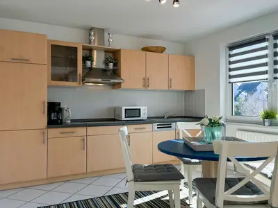 Küchenzeile im Wohnzimmer integriert