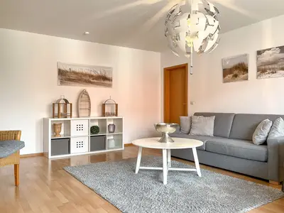 Wohnzimmer mit Schlafsofa