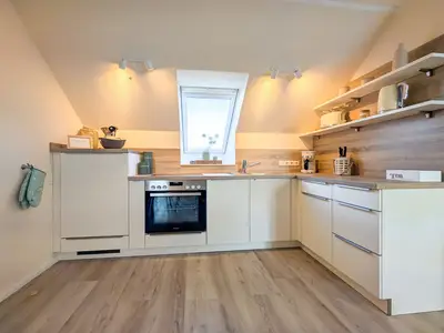 Küchenzeile im Wohnzimmer integriert