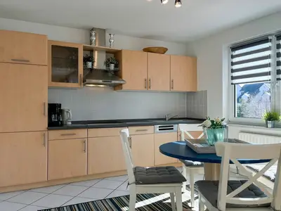 Küchenzeile im Wohnzimmer integriert