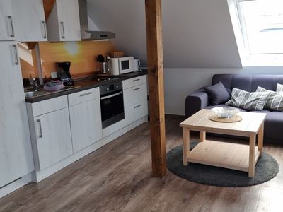 Wohnzimmmer mit Küche