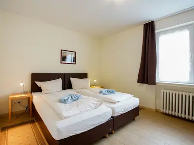 Zweites Schlafzimmer mit Boxspringbett