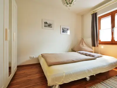 Ferienwohnung Kaiserblick - Schlafzimmer mit Sulzbergblick