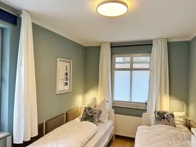 Schlafzimmer 2 mit zwei Einzelbetten