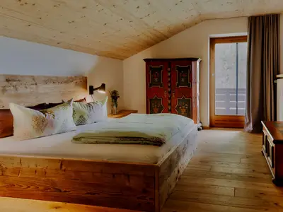 Schlafzimmer1  bei Buchung für Personen 1- 2 _Bett _Altholz