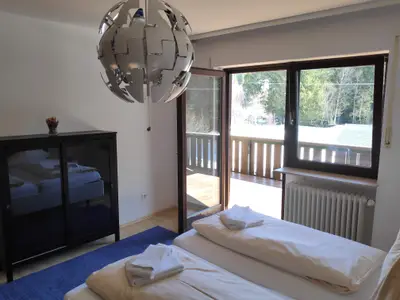 Schlafzimmer mit Balkon