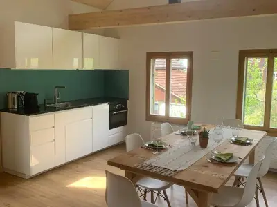 Wohnzimmer mit Essbereich und Küche