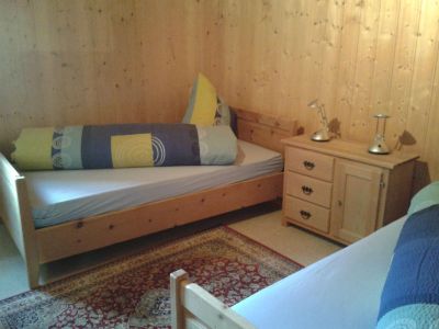 Ferienwohnung Cuort 20 Muoth - Schlafzimmer