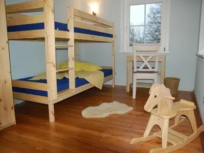 Schlafzimmer mit Doppelstockbett Rennsteigwässerchen