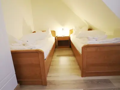Einzelbetten im zweiten Schlafzimmer