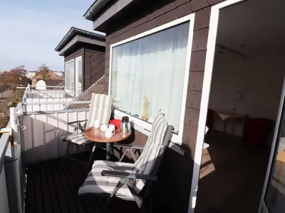 Balkon mit Sitzgelegenheit