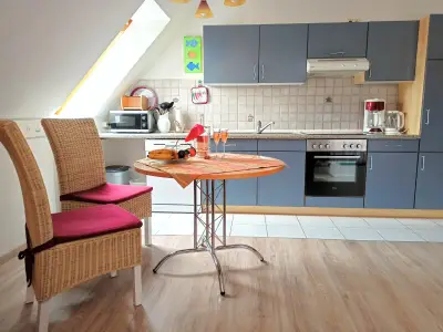 .. und angeschlossener Küche samt Essbereich