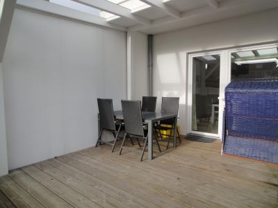 Ferienwohnung Erde im Haus Struve, überdachte Terrasse