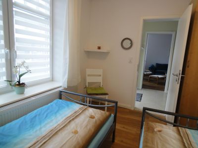 Ferienwohnung Erde im Haus Struve:  kleines Schlafzimmer