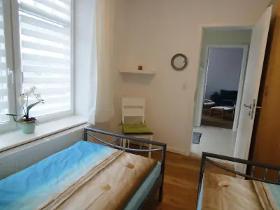 Ferienwohnung Erde im Haus Struve:  kleines Schlafzimmer