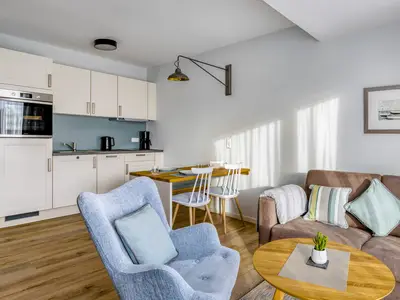 Wohnraum mit integrierter Küchenzeile