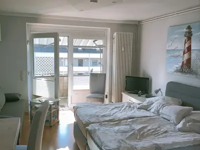 Wohn- und Schlafbereich mit offener Küche