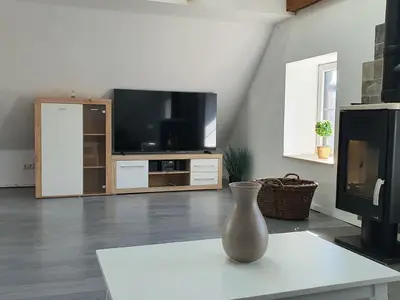 Wohnzimmer mit Kamin
